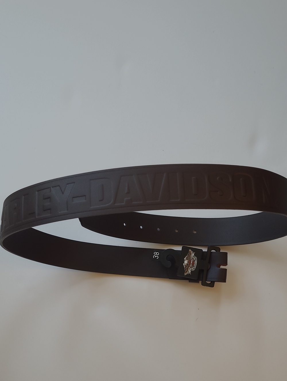 Harley-Davidson Black Embossed Logo Menโs Belt with Silver Accent